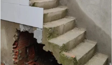 Após 12 anos foragida, polícia prende mulher suspeita de matar e concretar corpo do marido em escada, no Rj