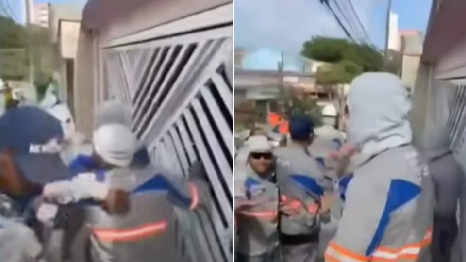 VÍDEO: terceirizados da Enel tentam derrubar portão de cliente