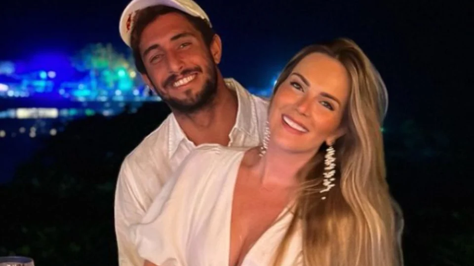FOTO: esposa de ex-BBB se emociona com imagem do marido e bebê resgatado no RS