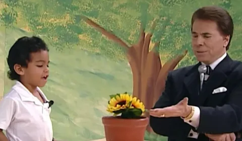 Fã do Raça Negra que virou meme homenageia Silvio Santos; veja
