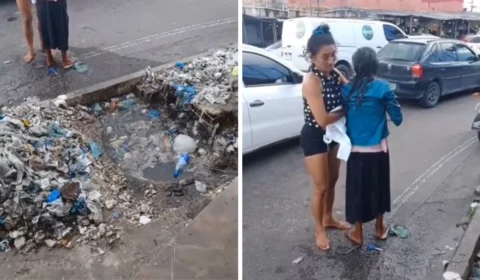 Idosa cai em um bueiro entupido e cheio de lixo ao tentar atravessar rua em Manaus; veja vídeo