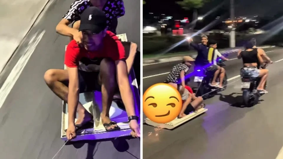 Influenciador ‘surfa’ em porta de geladeira em av. de Manaus, mas é surpreendido pela ROCAM; veja vídeo