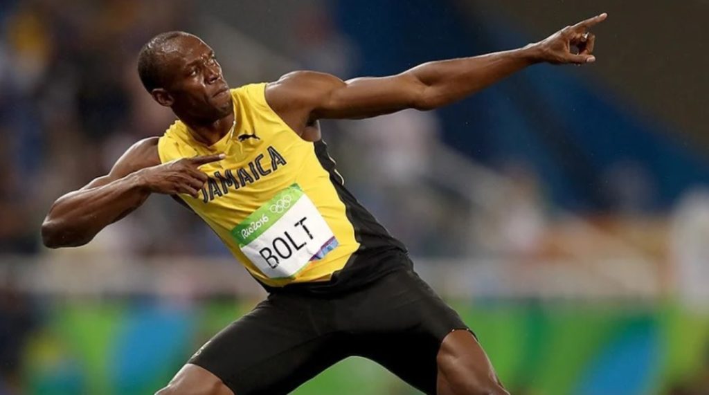 Usain Bolt, nos tempos de atletismo, fazendo o gesto que eternizou o velocista - Foto: Reprodução/Instagram @usainbolt
