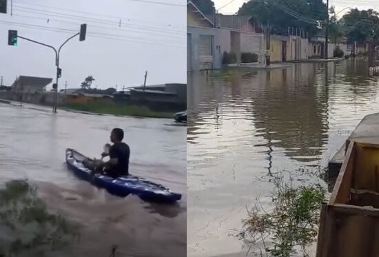 Morador 'passeia' de canoa em rua alagada de Boa Vista