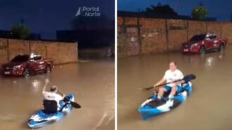 O homem navega de caiaque pela rua alagada em Porto Velho - Foto: Repropdução TV Norte Rondônia